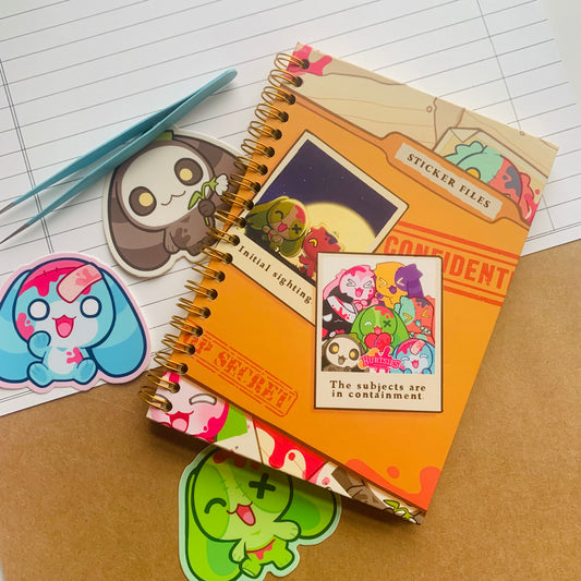 Sticker notebook with illustration of cute zombie rabbits with the text "Sticker Files" on a paper background